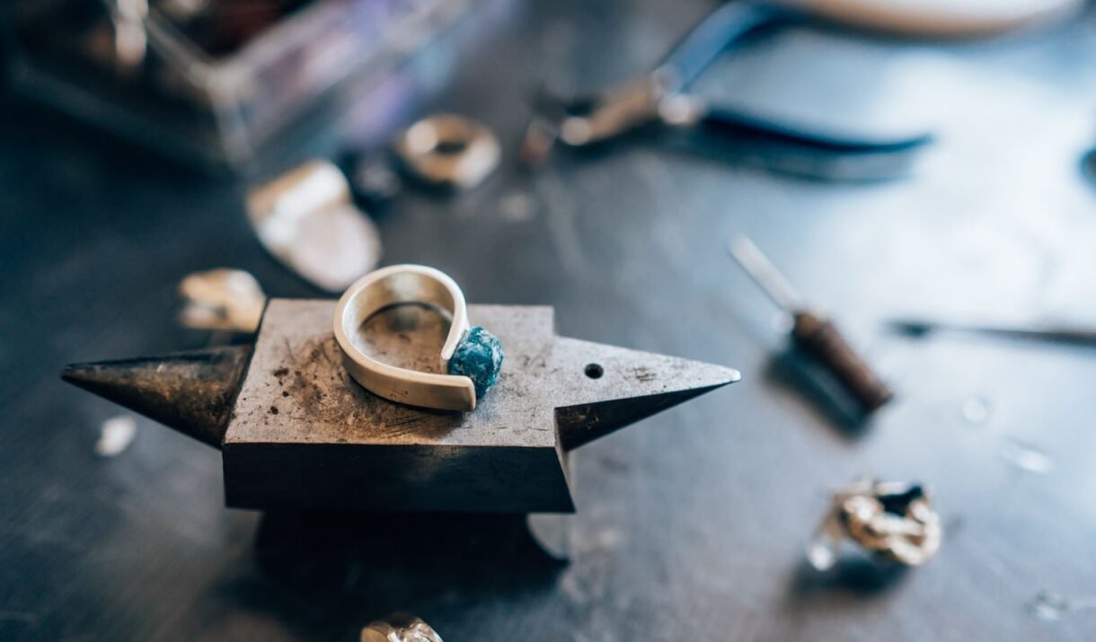 different jewelery on the table from the jeweler f cynsmhk